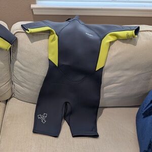 XCEL Kids One Piece Bodysuit - Black and Yellow